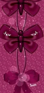 Purple butterfly and ribbon wallpaper with jewel accents.