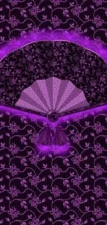 Elegant purple fan with floral patterns wallpaper.