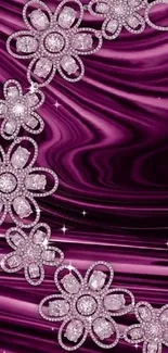 Elegant floral mobile wallpaper with jeweled flowers on a purple background.