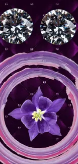 Elegant purple wallpaper with gems and a central flower design.