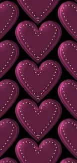 Purple heart pattern wallpaper with dotted details on black background.