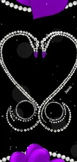 Purple heart design with gems on black background.