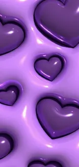 Glossy 3D purple hearts on lavender background.