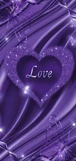 Purple love heart with glittery accents on mobile wallpaper.