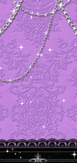 Purple damask wallpaper with silver chains and black accents.