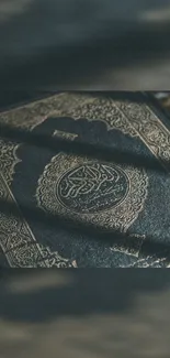 Intricately designed Quran cover with elegant patterns.