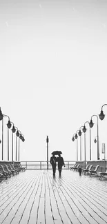 Black and white wallpaper of a rainy pier with street lamps and an umbrella.