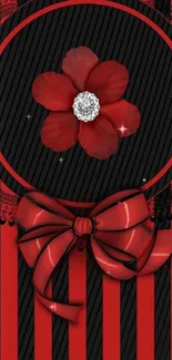 Red and black wallpaper with flower and bow design.