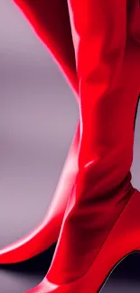 Vibrant red high-heeled boots in elegant design.