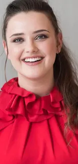 Smiling woman in a red dress with elegant style.