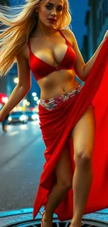 Woman in red dress walking through a city at night.