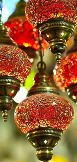 Elegant hanging red lanterns with intricate design.