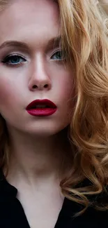 Elegant portrait with red lips and golden curly hair.