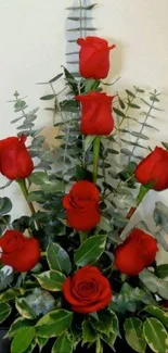 Red roses with green foliage mobile wallpaper.