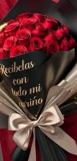 Elegant bouquet of red roses with black wrap and golden ribbon.