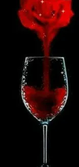 Red rose in wine glass on black background wallpaper.