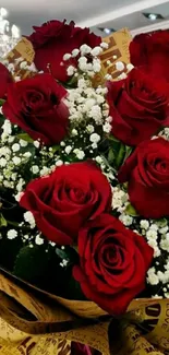 Elegant bouquet of red roses and baby's breath flowers.