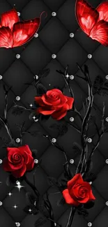 Red roses and butterflies on black quilted background.