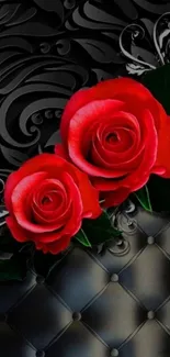 Red roses on black floral pattern wallpaper.