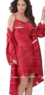 Woman in elegant red satin nightwear leaning against a textured wall.