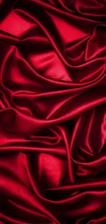 Luxurious red silk fabric folds as mobile wallpaper.