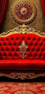 Luxurious red sofa with gold details and ornate background.