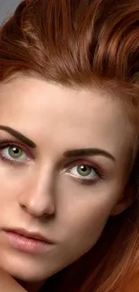 Red-haired woman with green eyes portrait wallpaper.