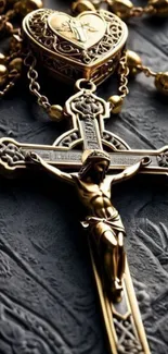 Golden cross and rosary on textured surface.