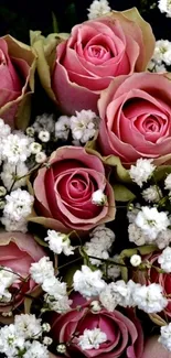 Elegant pink rose bouquet with white flowers.