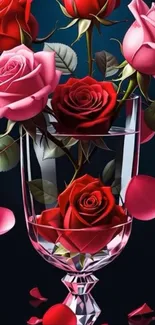 Red and pink roses arranged in a glass vase with falling petals.