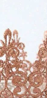 Rose gold lace crown on elegant background.