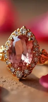 Elegant rose gold ring with pink gemstone and diamond accents.
