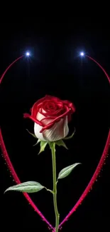 A red rose with a glowing heart design against a black background.