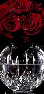 Beautiful mobile wallpaper with red roses in a crystal vase.