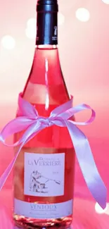 Rose wine bottle with pink ribbon, elegant and soft ambiance.