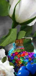 Elegant white roses with colorful beads jar on mobile wallpaper.