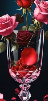 Elegant pink and red roses in a crystal vase on a dark background.