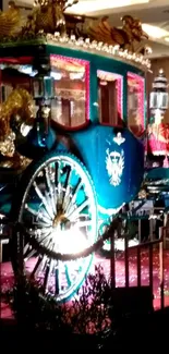 Vibrant blue royal carriage with golden details, perfect for mobile wallpaper.