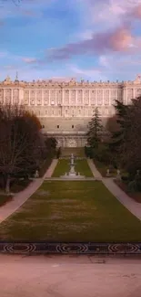 Royal Palace under a pink sky with green gardens.