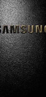 Samsung logo on black leather texture background.