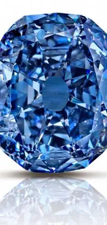 Blue diamond with sparkling facets on a white background.