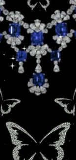 Sapphire and diamond jewelry with butterflies on black background.