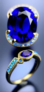 Sapphire and gold jewelry with blue backdrop