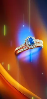 Close-up of a sapphire ring set in gold with an elegant orange gradient background.