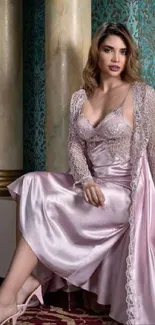 Woman in luxe satin gown with elegant decor backdrop.