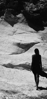 Silhouette against a textured desert background in black and white.