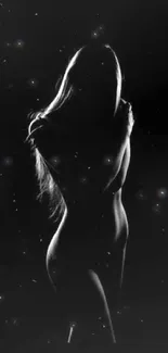 Silhouette of a woman in artistic black and white design.