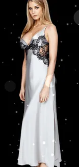 Elegant lady in a silver gown with lace detail.