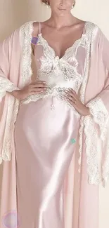 Elegant silk nightwear with lace robe in pastel tones.