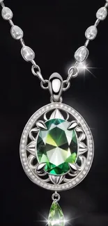 Elegant silver necklace with green gemstone.